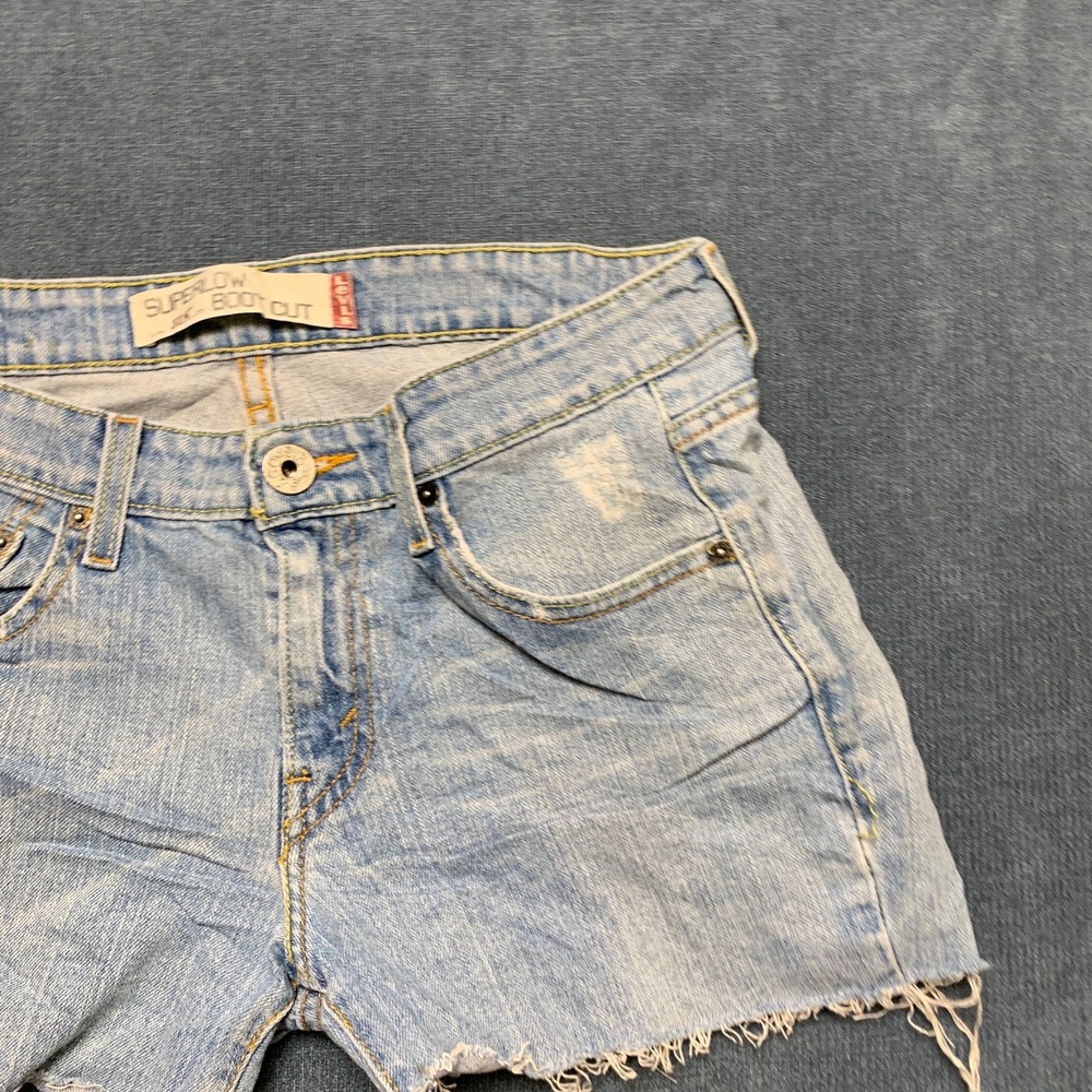 Levi's 518 Superlow Cut Off Shorts Womens Blue Denim Light Wash Red Tab Raw Hem - Picture 4 of 15
